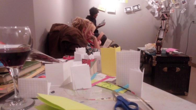 A studious opening, with lots of mini-zines ready to go